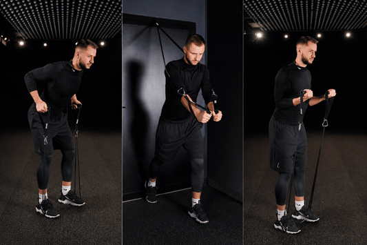 Man performing resistance band back exercises at home with long bands