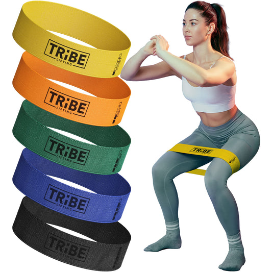 Fabric mini loop resistance bands set of 5 for legs and glutes shown during a squat exercise