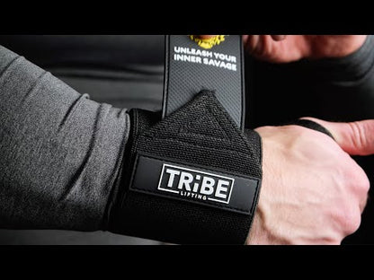Tribe Lifting heavy-duty 21 inch wrist wraps and straps set promo video showing gray, green, and black lifting straps hanging on a bar for grip support during strength training.
