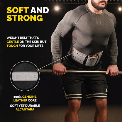 Man using the gray Alcantara Tribe Lifting 5mm genuine leather weight lifting belt during a lift with emphasis on soft comfort and strong support