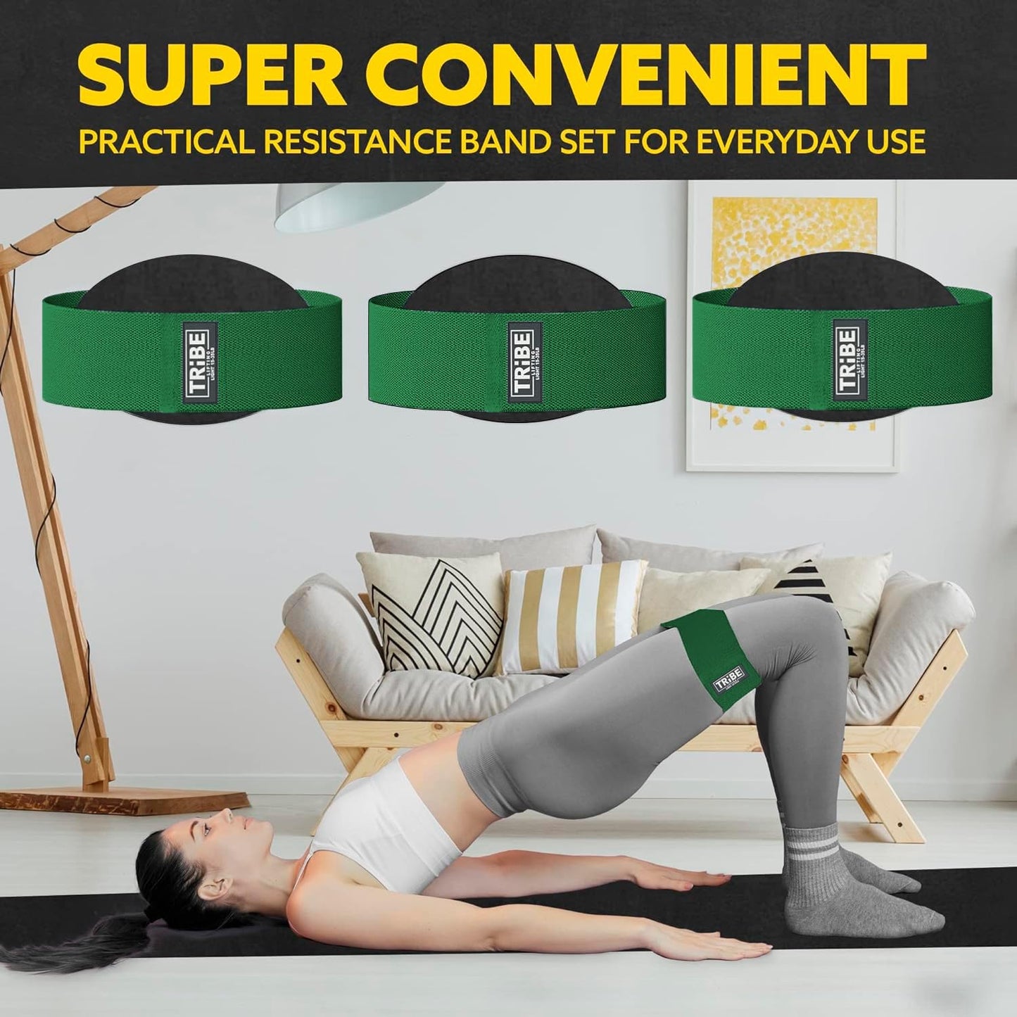 Woman demonstrating a glute bridge with the Tribe Lifting green premium resistance band during a home workout