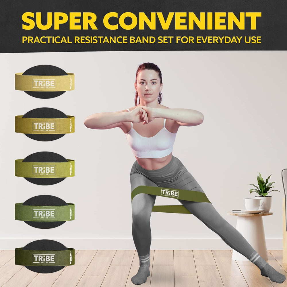 Woman demonstrating a side lunge with the military green fabric resistance band from the Tribe Lifting resistance bands set of 5 at home