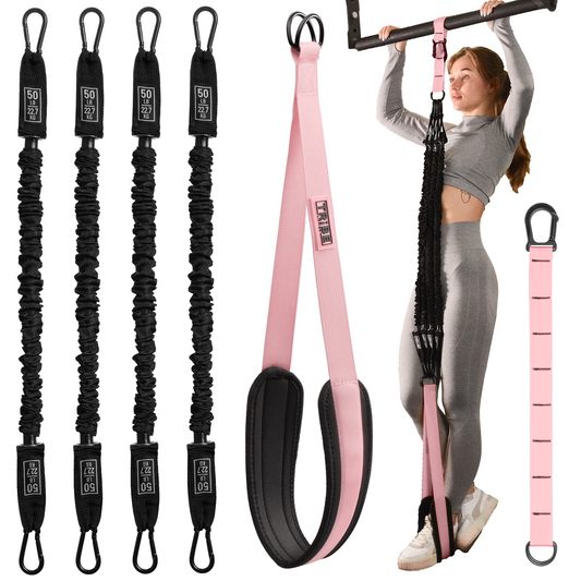 Woman using the pink Tribe Lifting pull-up assistance set with four 50 lb resistance bands, padded foot strap, adjustable extension strap, and pull-up bar attachment for assisted pull-up training.
