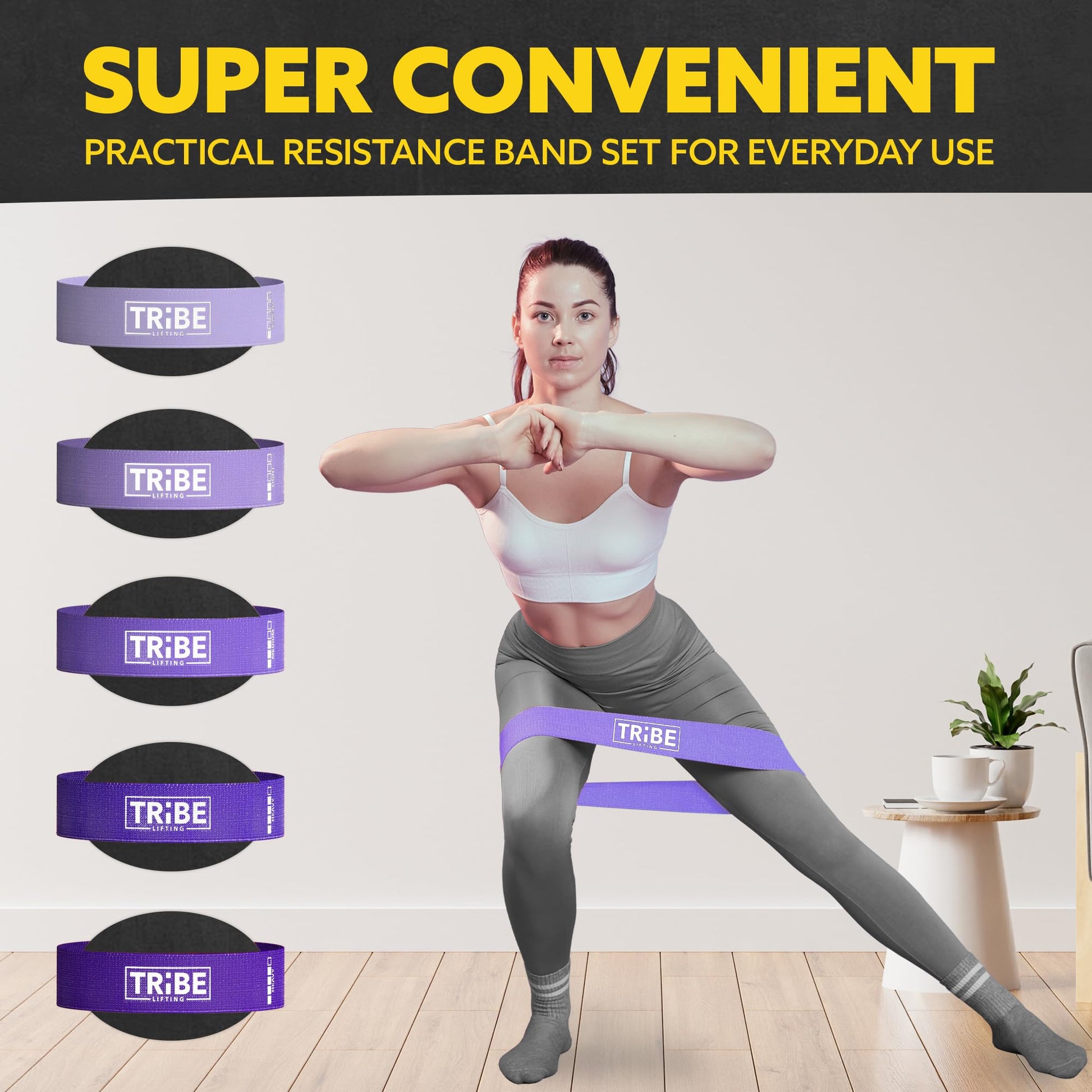 Woman demonstrating a side lunge with the purple fabric resistance band from the Tribe Lifting resistance bands set of 5 at home